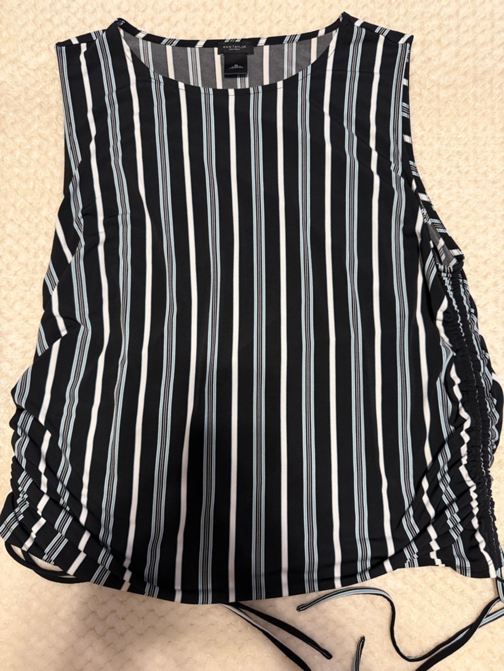And Taylor sleeveless top